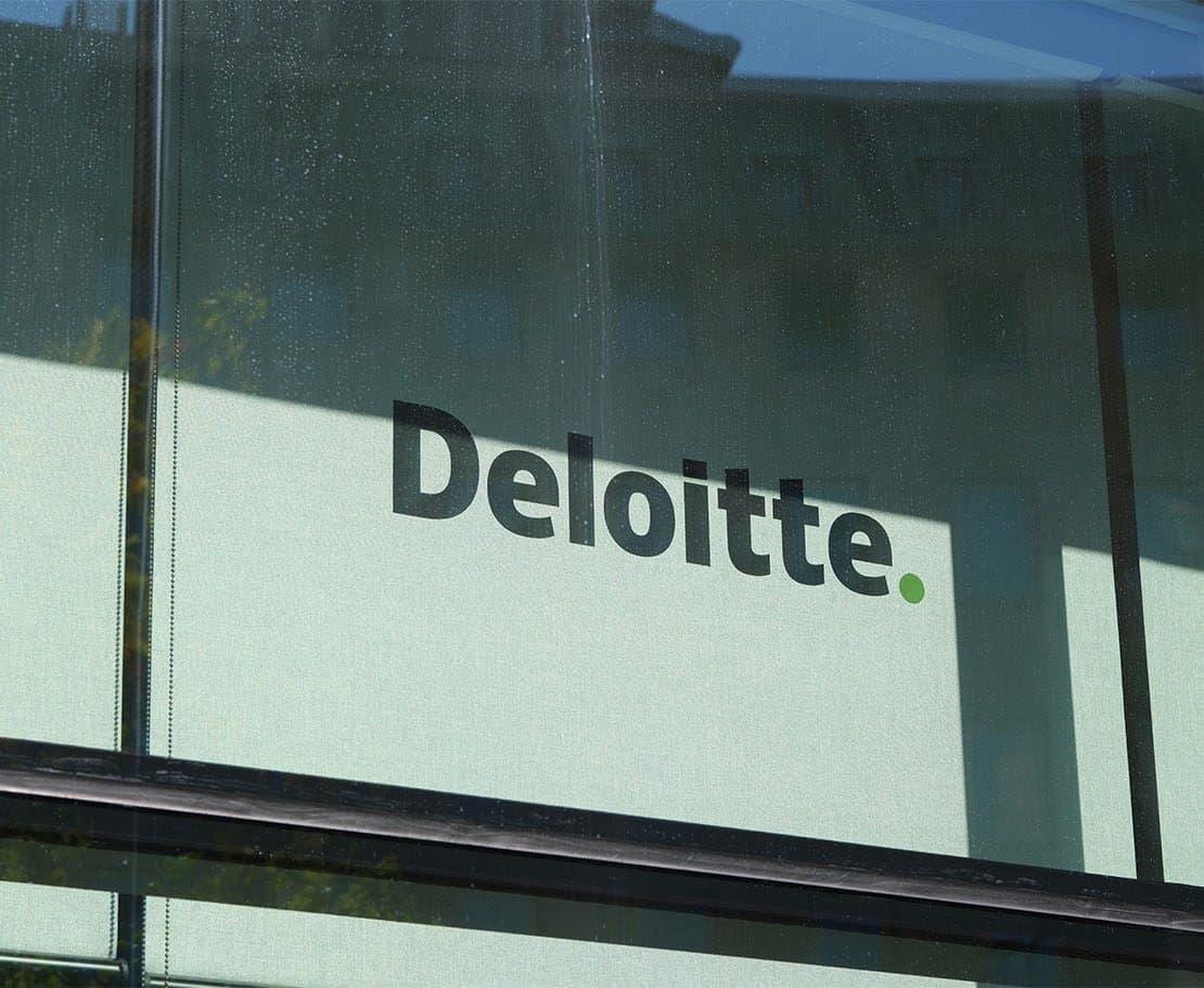Deloitte sign on building to support In‑House CLO article