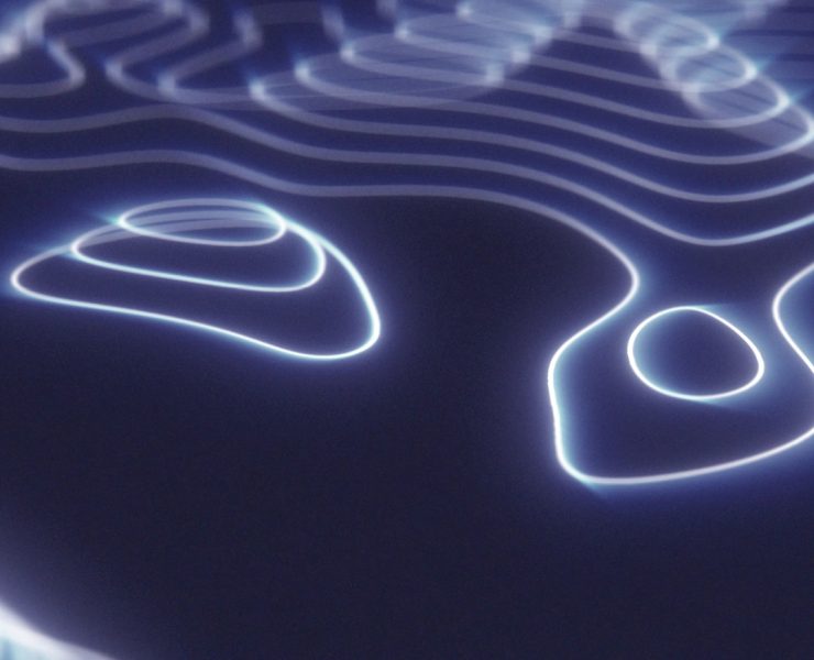 a digital rendering of a futuristic hi-tech landscape created with glowing blue energy circles.