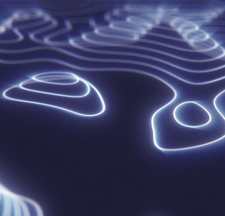 a digital rendering of a futuristic hi-tech landscape created with glowing blue energy circles.