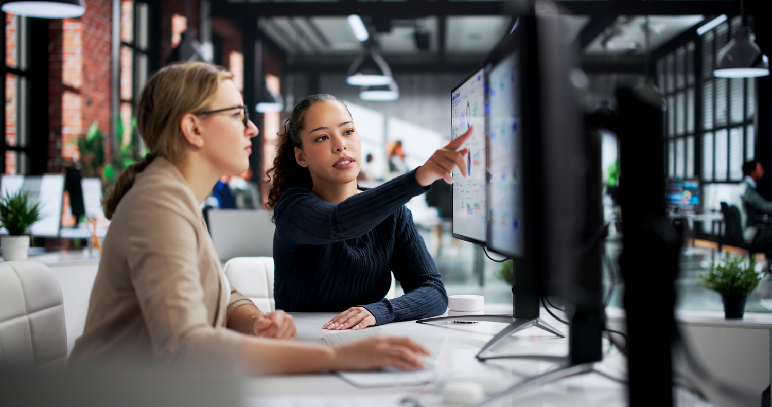 Corporate legal professionals using AI-powered software to streamline legal operations and contract review workflows.