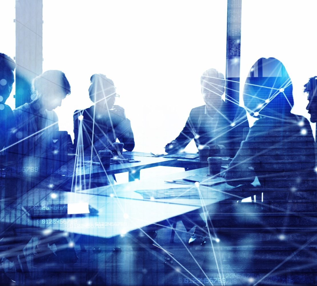 Corporate legal professionals reviewing business strategy and AI governance initiatives in a modern boardroom.