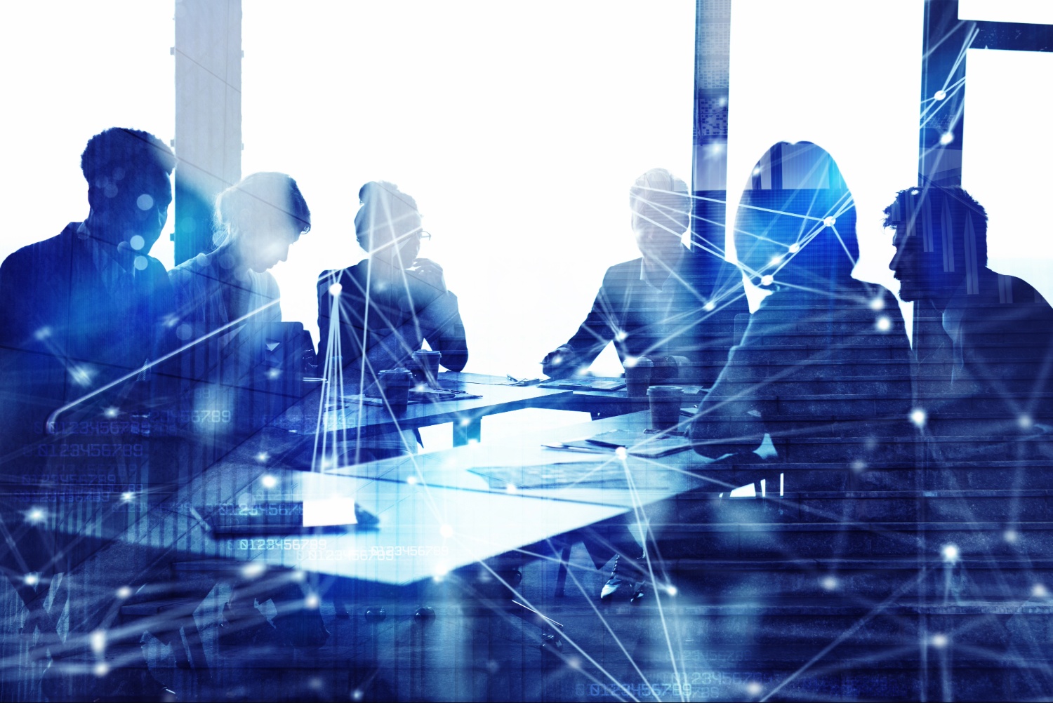 Corporate legal professionals reviewing business strategy and AI governance initiatives in a modern boardroom.