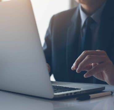 Corporate legal professionals using artificial intelligence to improve legal research, document review and strategic decision-making within an enterprise legal department.