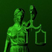 a green, digital-style representation of Lady Justice holding the scales of justice